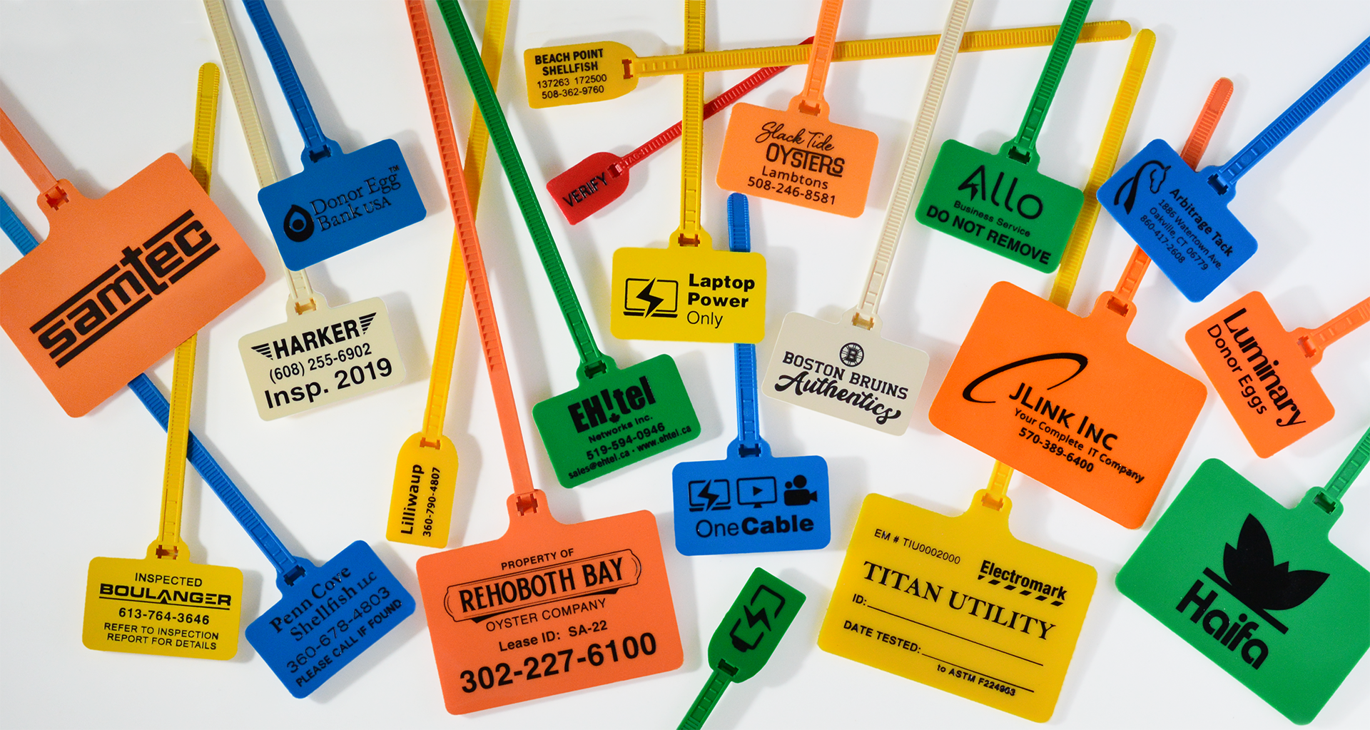 Color-coded plastic cable tie ID tags used for industrial equipment identification and labeling
